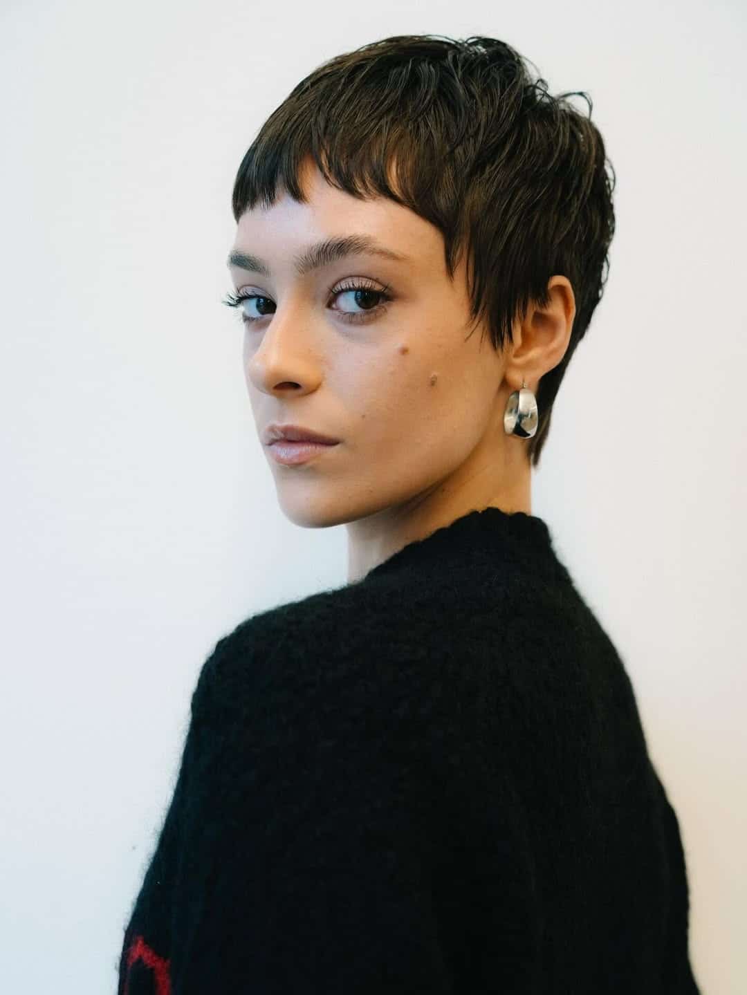 10. Short Black Pixie with Baby Bangs - Pixie Hairstyles With Bangs