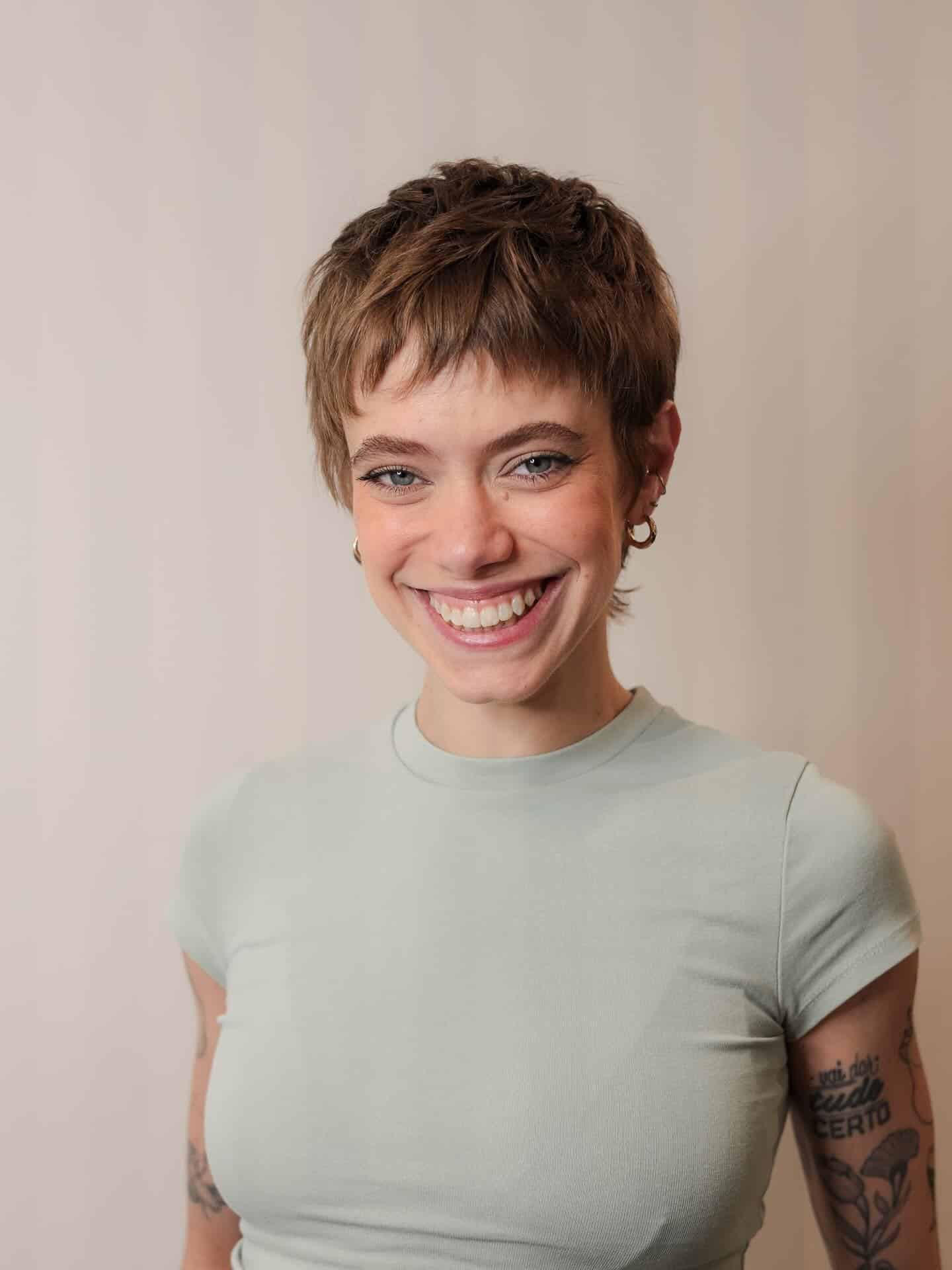 12. Textured Chestnut Pixie with Cropped Bangs - Pixie Hairstyles With Bangs