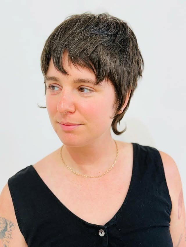 13. Dark Brunette Shag Pixie with Wispy Bangs - Pixie Hairstyles With Bangs