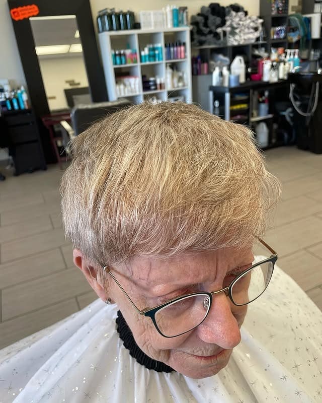 20. Soft Beige Blonde Pixie with Tapered Bangs - Pixie Hairstyles With Bangs