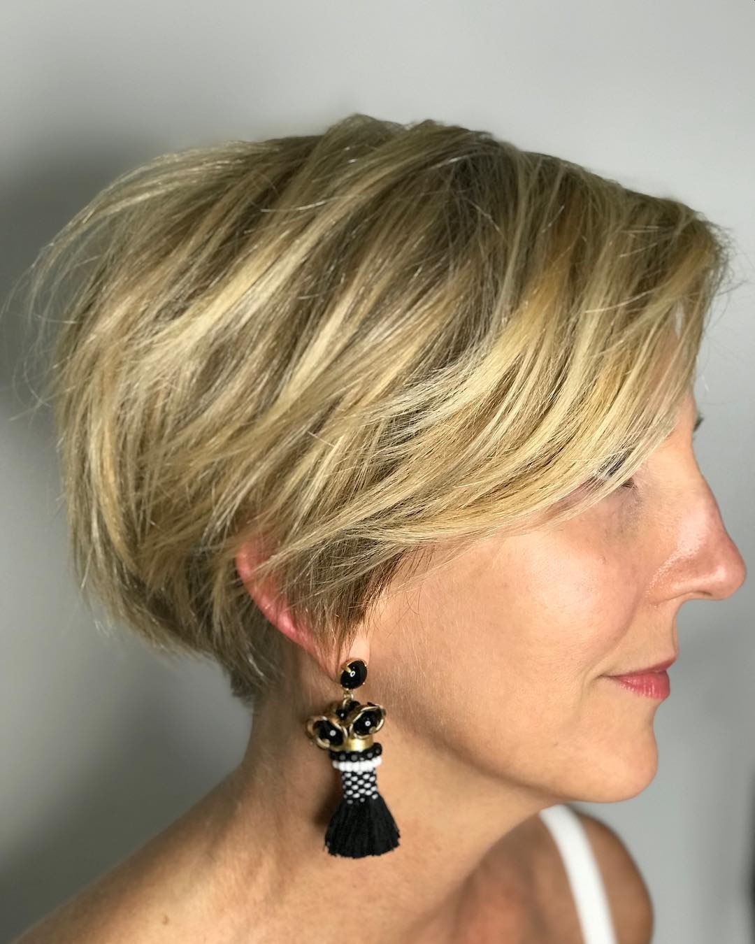3. Golden Blonde Textured Pixie Bob - Short Tapered Haircut