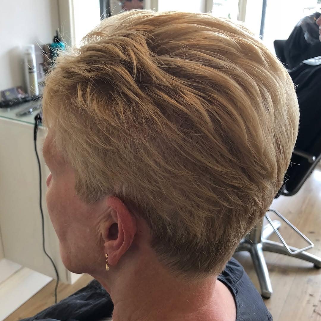 8. Honey Blonde Feathered Pixie - Short Tapered Haircut