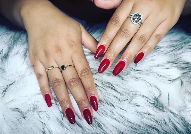 1. Deep Cherry Almond Nails - solid nail color ideas 