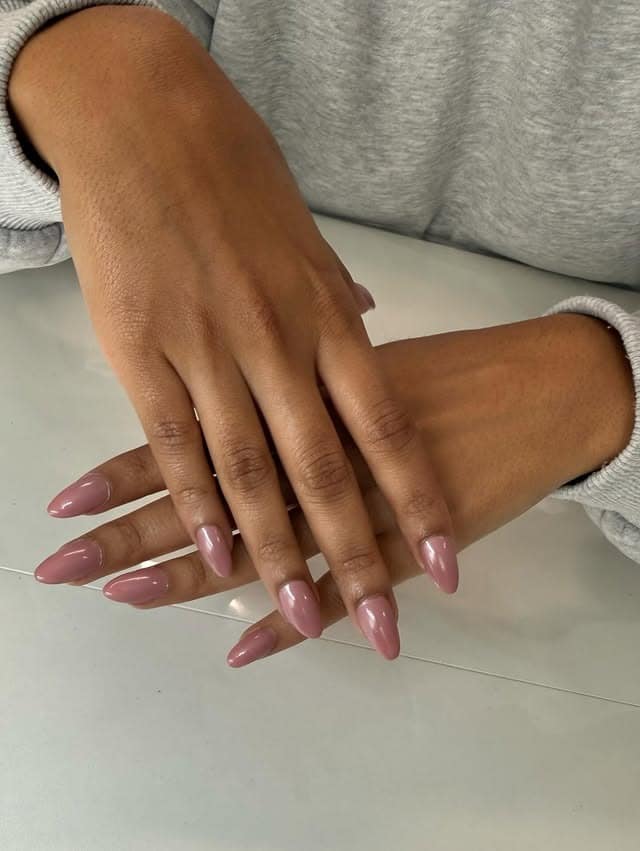 3. Soft Mauve Almond Nails - solid nail color ideas 