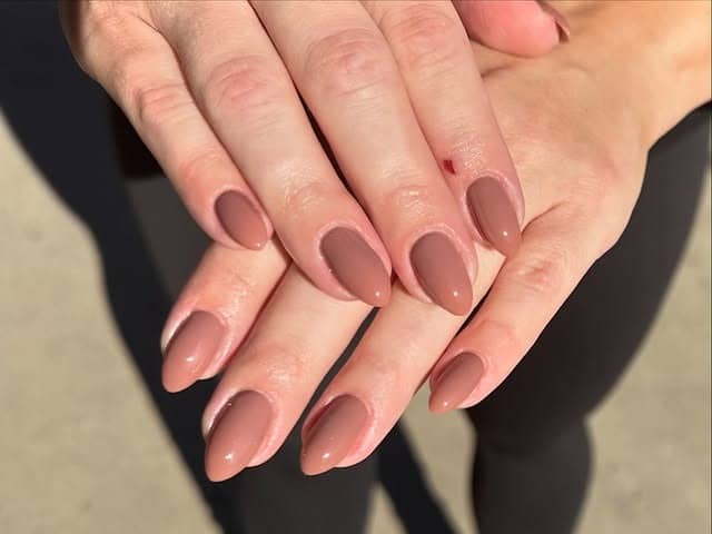 6. Taupe Gloss Almond Nails - solid nail color ideas 