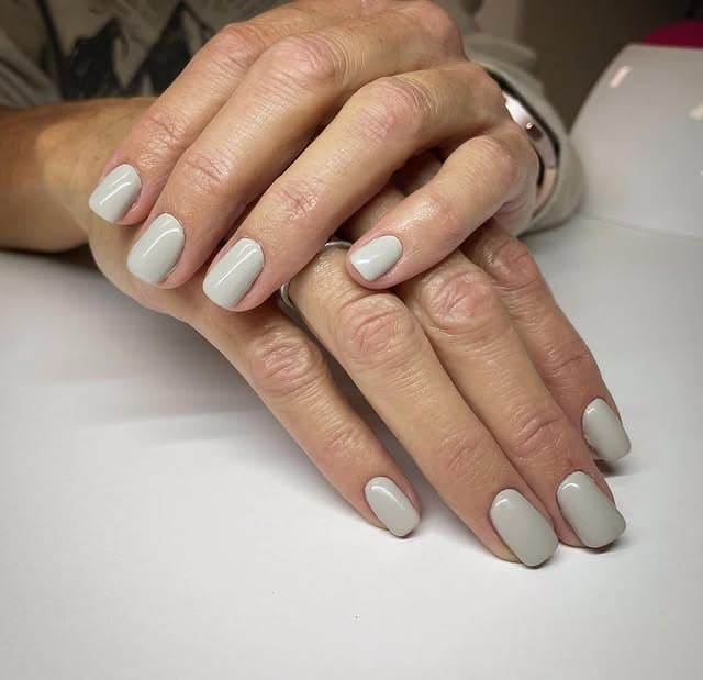 7. Soft Gray Short Square Nails - solid nail color ideas 