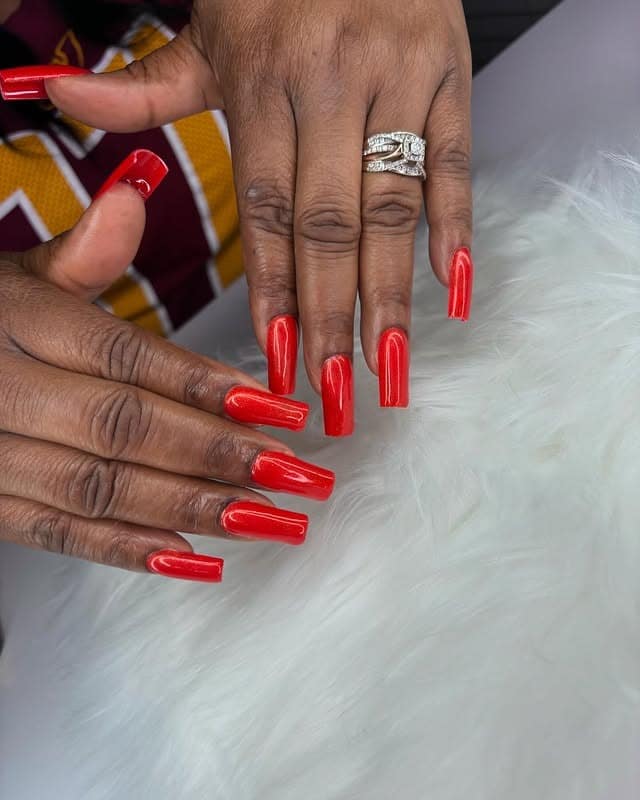 9. Candy Apple Red Coffin Nails - solid nail color ideas 