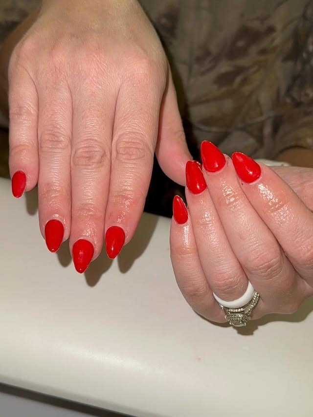 11. Classic Scarlet Almond Nails - solid nail color ideas 
