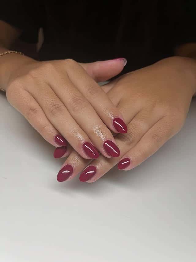 22. Berry Wine Oval Nails - solid nail color ideas 