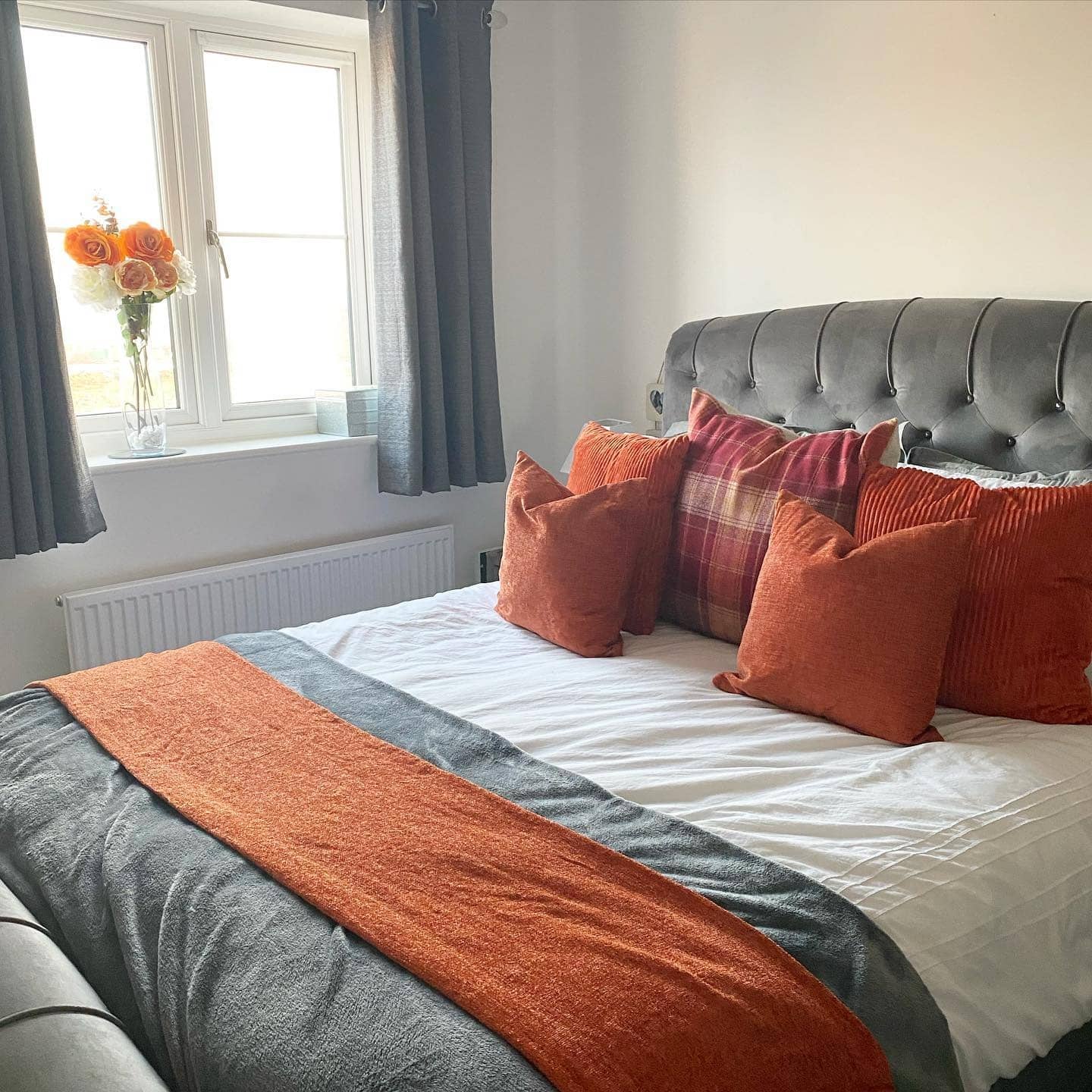 8. Burnt Orange and Gray Modern Bedroom - burnt orange bedroom ideas