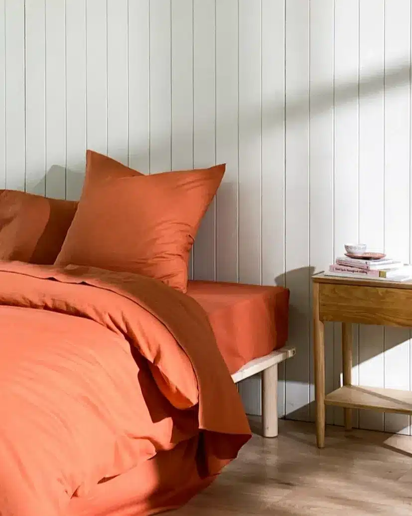 12. Minimalist Burnt Orange Linen Bedroom - burnt orange bedroom ideas