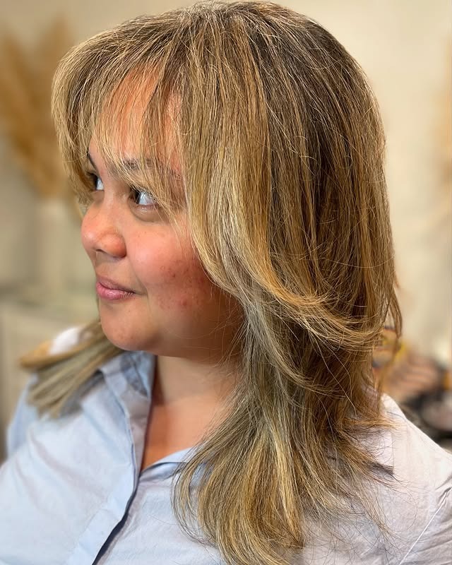 2. Beige Blonde Layered Shag with Face-Framing Fringe - Medium Wispy Haircuts