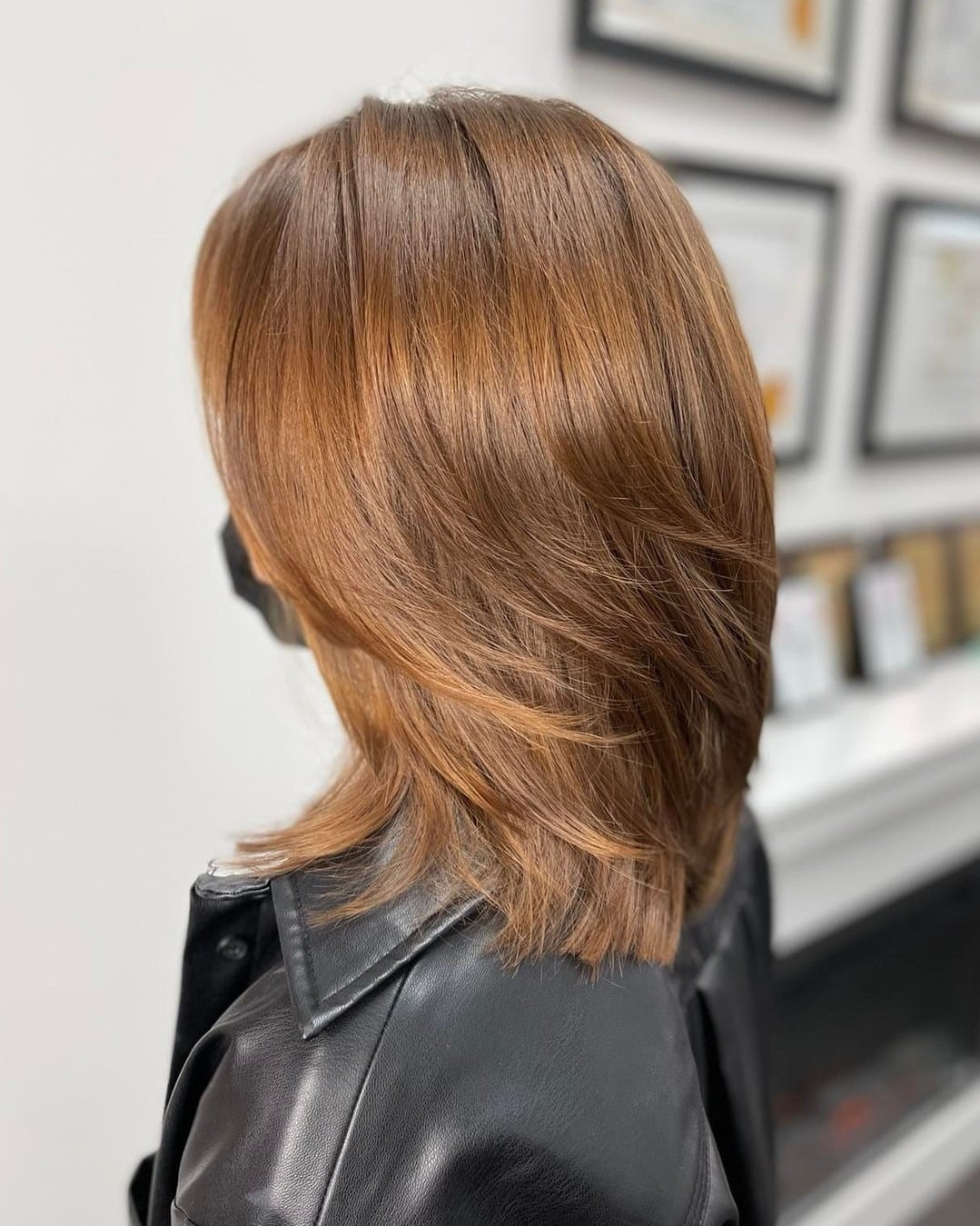 4. Cinnamon Brown Wispy Layers with Flipped Ends - Medium Wispy Haircuts