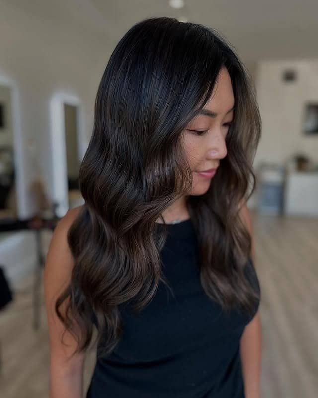 7. Espresso Brown Long Layers with Loose Waves - Medium Wispy Haircuts