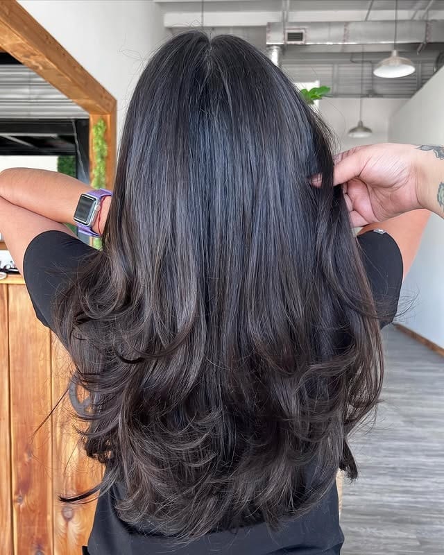 12. Midnight Black Layered Cut with Feathered Ends - Medium Wispy Haircuts