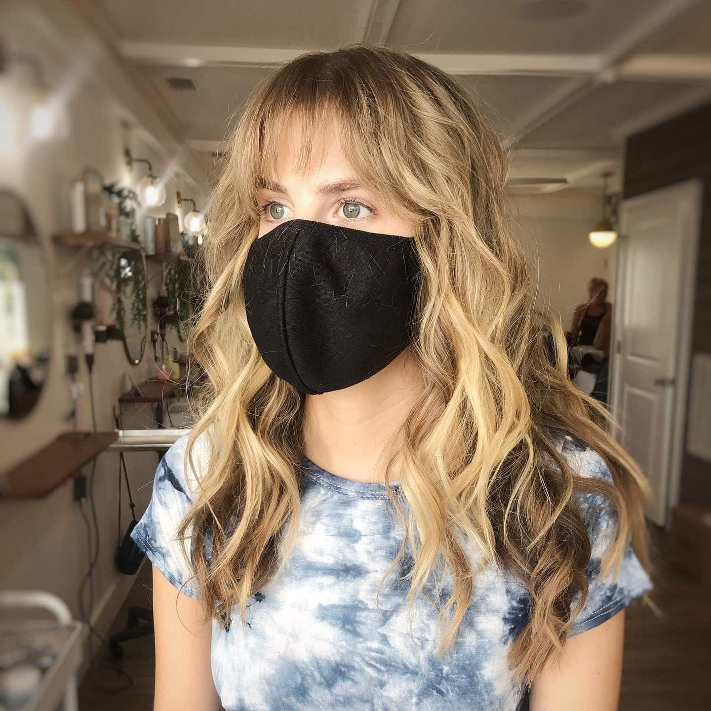 13. Sandy Blonde Shag Waves with Wispy Fringe - Medium Wispy Haircuts