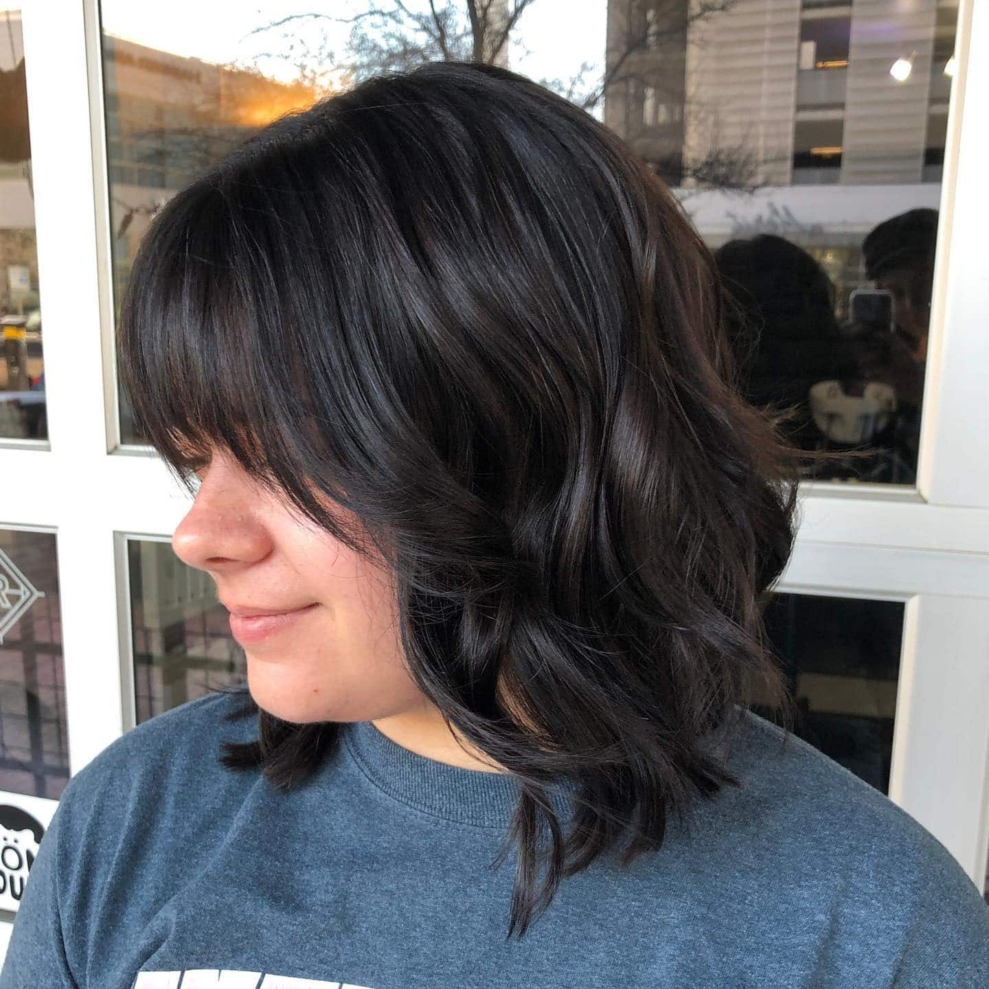 16. Glossy Espresso Wavy Bob with Wispy Bangs - Medium Wispy Haircuts