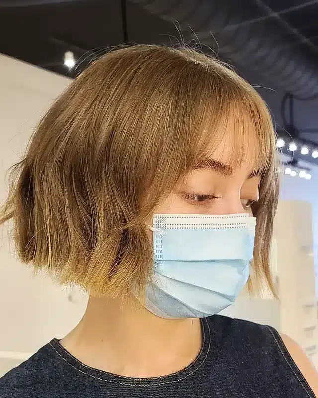 2. Textured Honey Blonde French Bob - Short Wispy Bob Haircuts