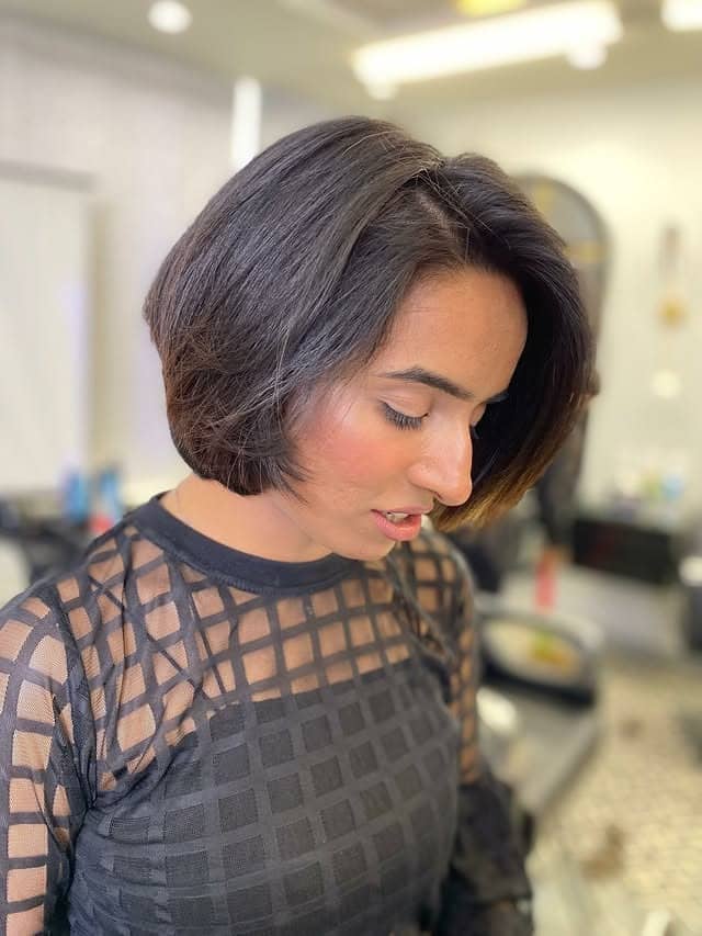 16. Rounded Dark Mocha Bob - Short Wispy Bob Haircuts