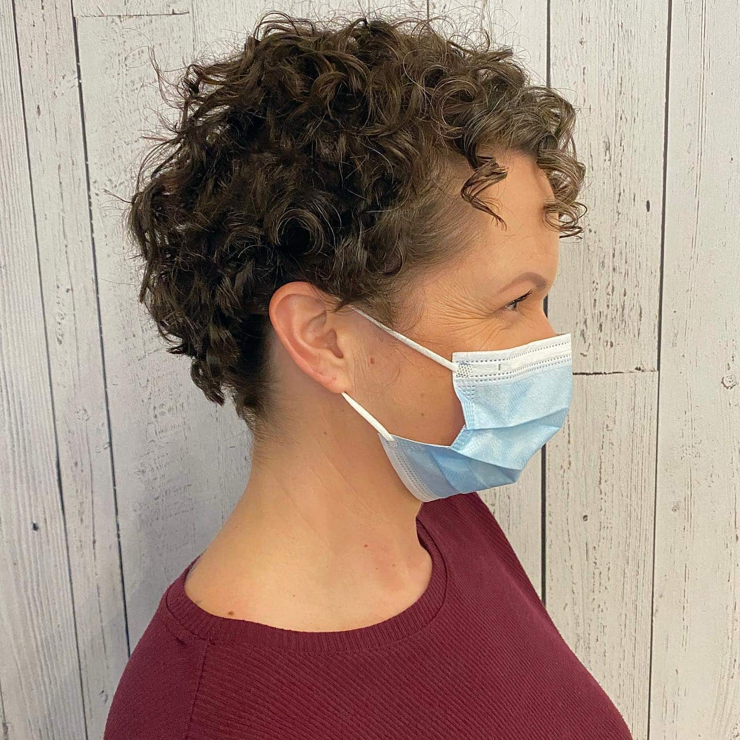 3. Espresso Curly Pixie with Undercut Detail - Curly Pixie Hairstyles