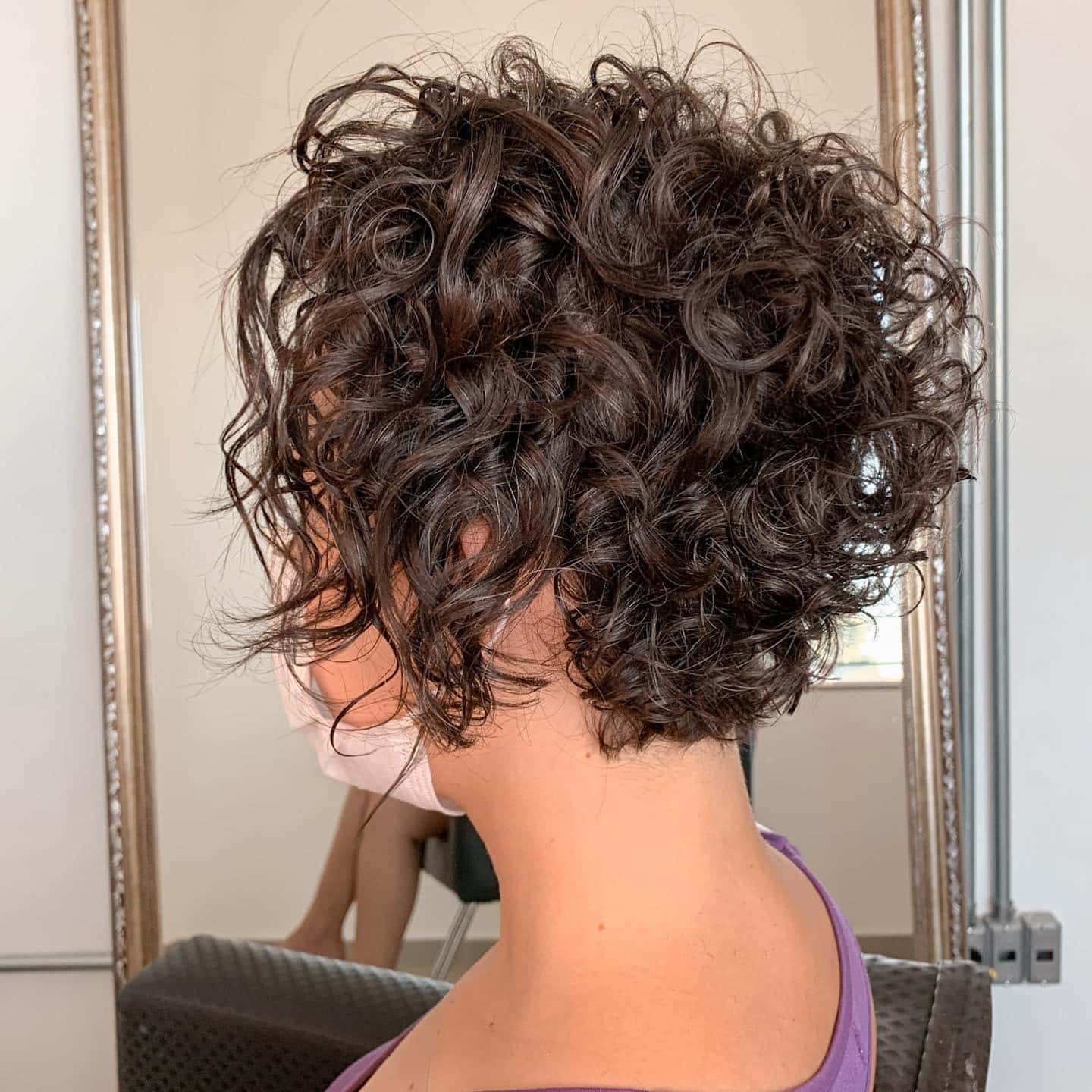 7. Rich Brunette Tousled Curly Pixie - Curly Pixie Hairstyles