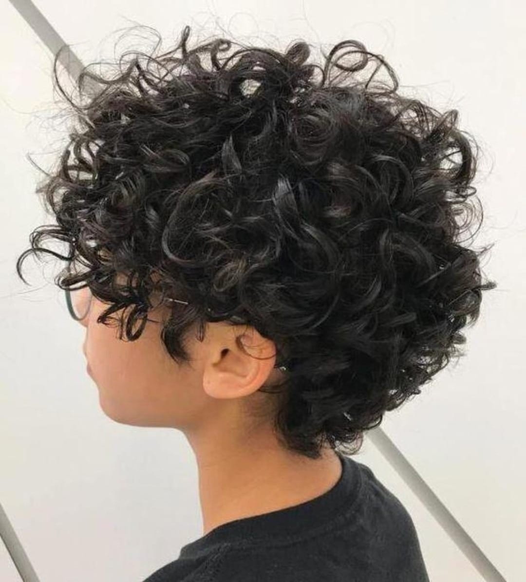 12. Jet Black Curly Pixie with Rounded Layers - Curly Pixie Hairstyles
