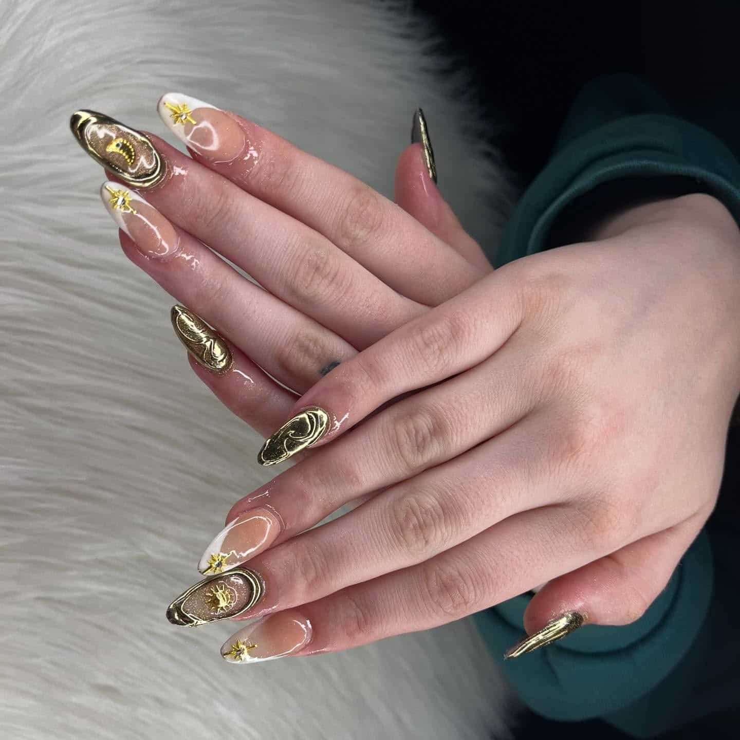 1. Gold Chrome Celestial Almond Nails - almond nail ideas