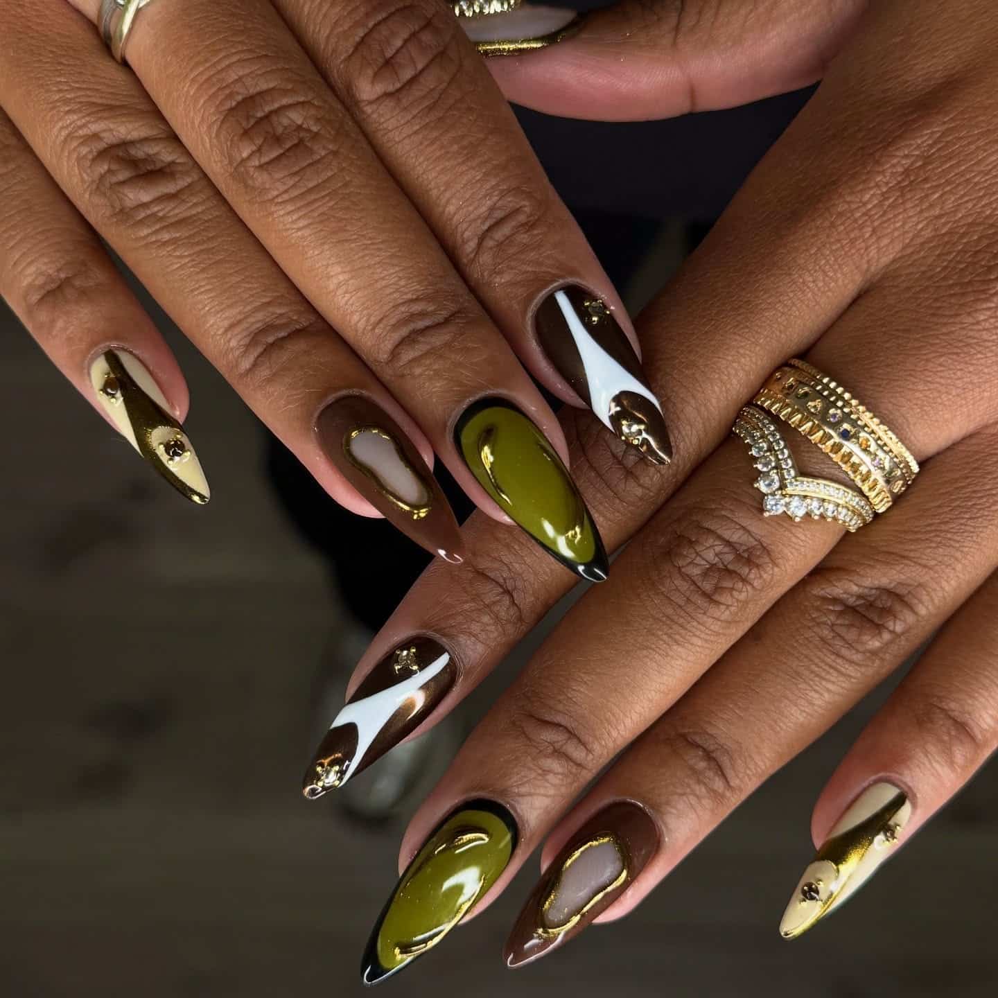 4. Olive Green and Chocolate Swirl Almond Nails - almond nail ideas