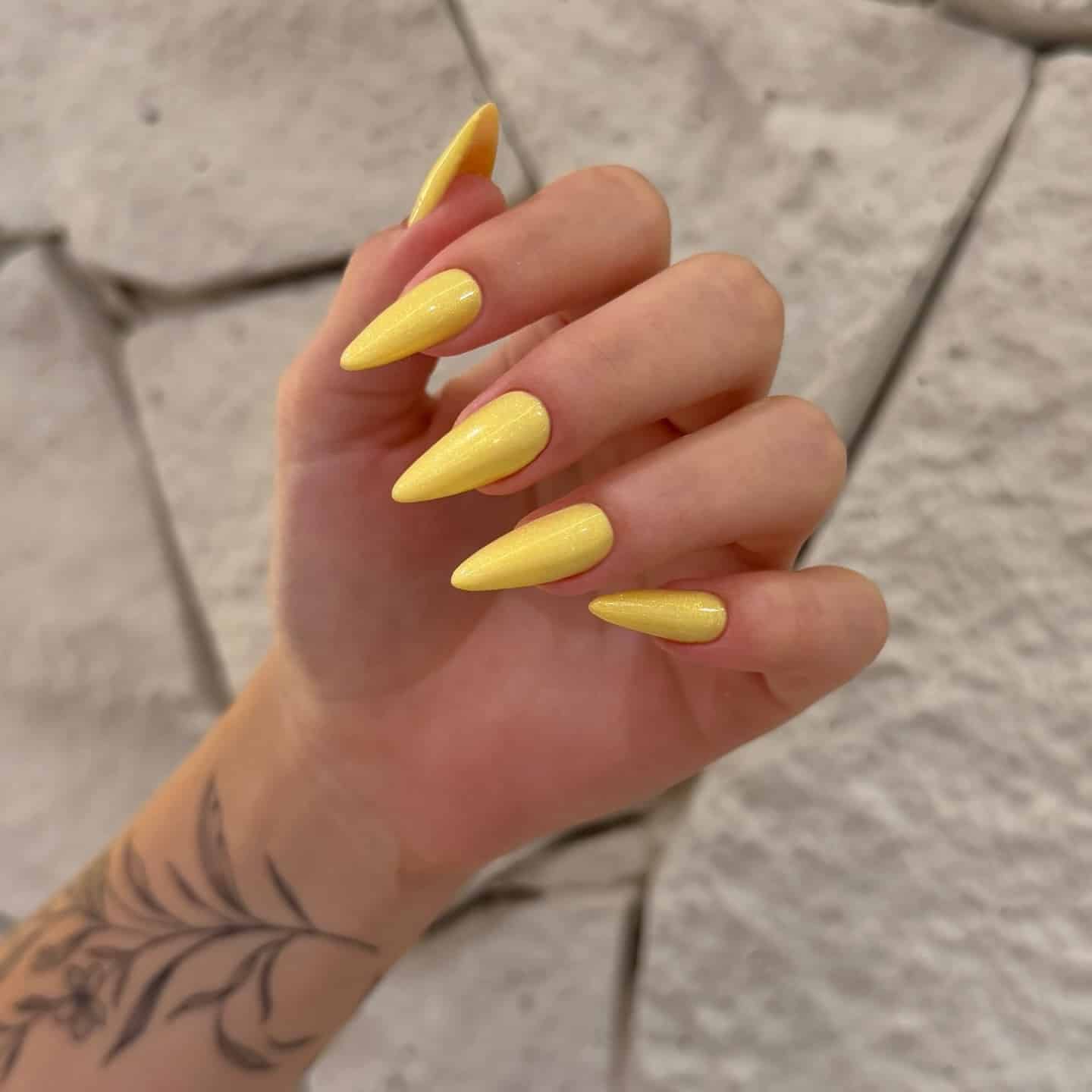 5. Soft Butter Yellow Almond Nails - almond nail ideas