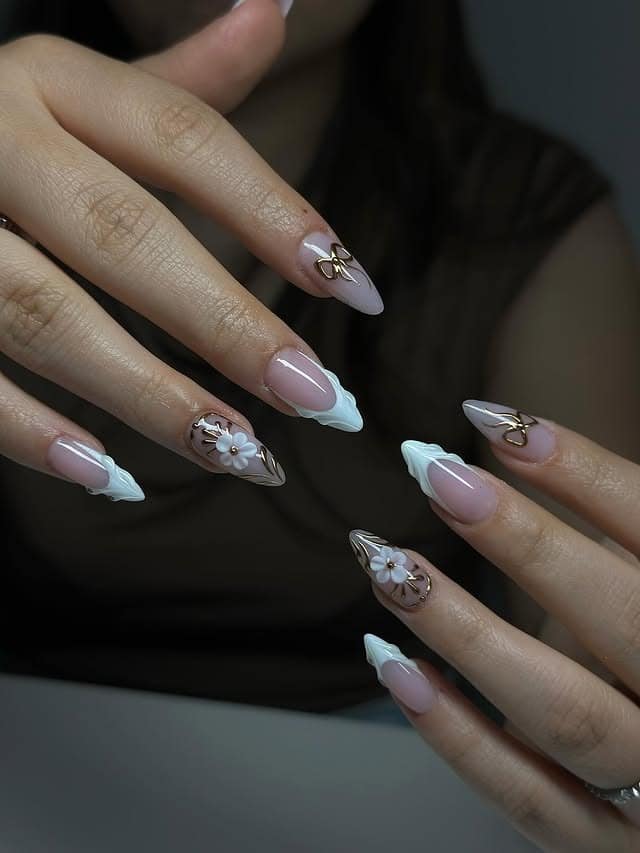 15. White Floral 3D Almond Nails with Gold Chrome - almond nail ideas