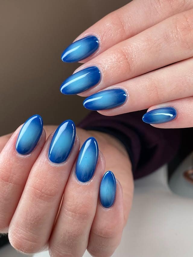 16. Electric Blue Ombre Almond Nails - almond nail ideas