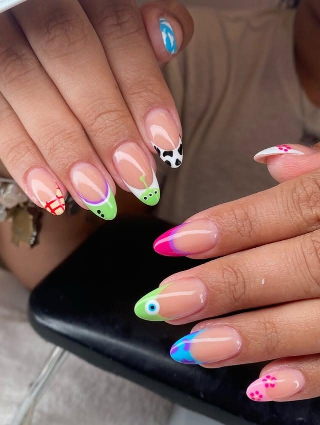 18. Colorful Abstract French Almond Nails - almond nail ideas