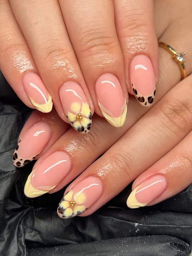 19. Soft Yellow Floral Almond Nails with Animal Print Tips - almond nail ideas