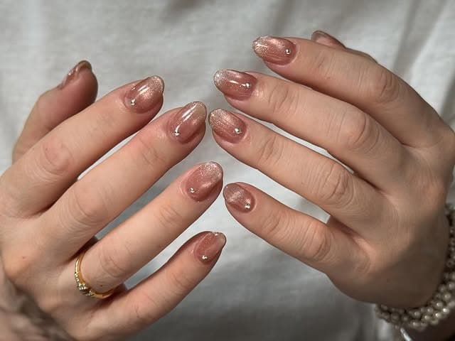 4. Rose Gold Shimmer Gradient Nails - office nail ideas