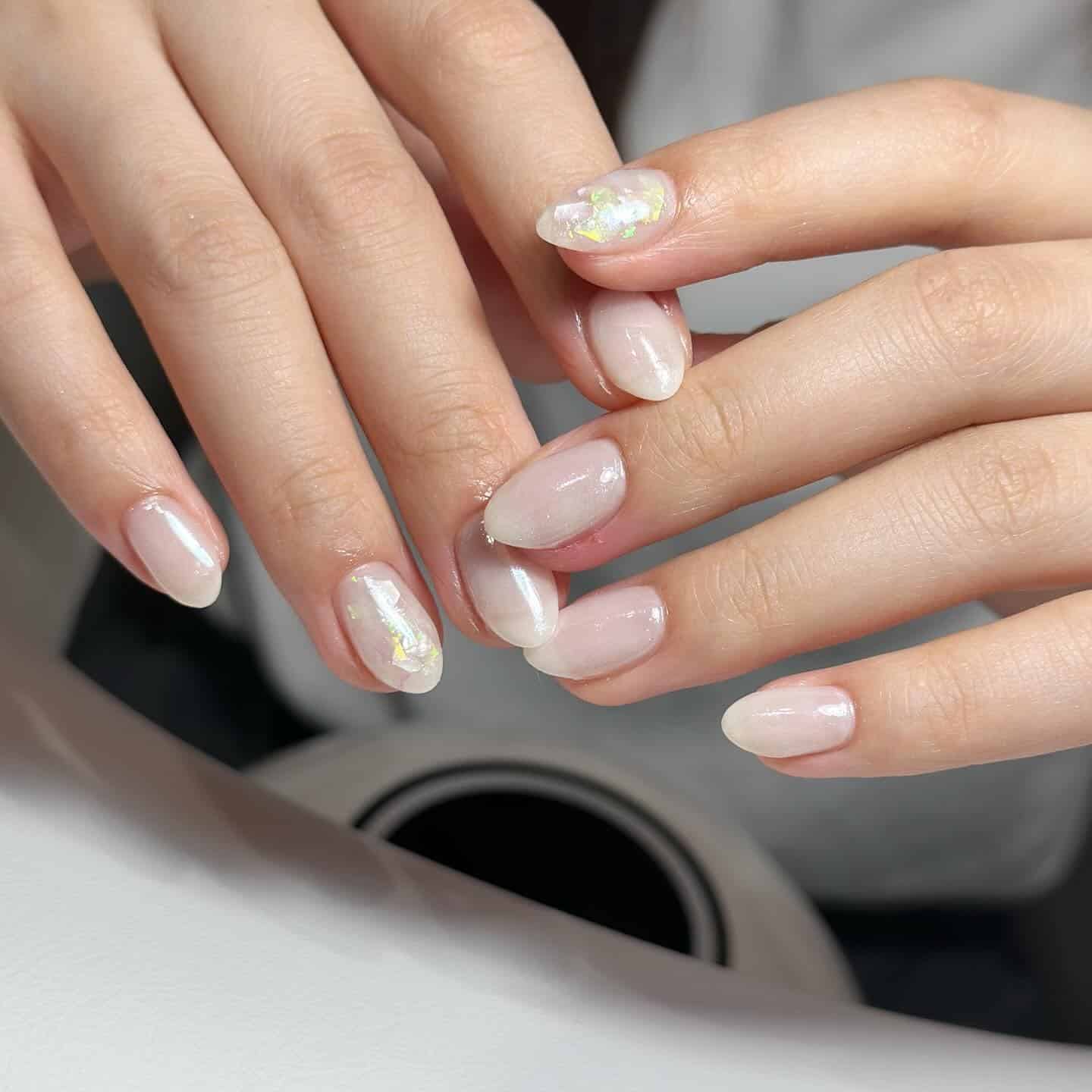 6. Pearl Glazed White Almond Nails - office nail ideas
