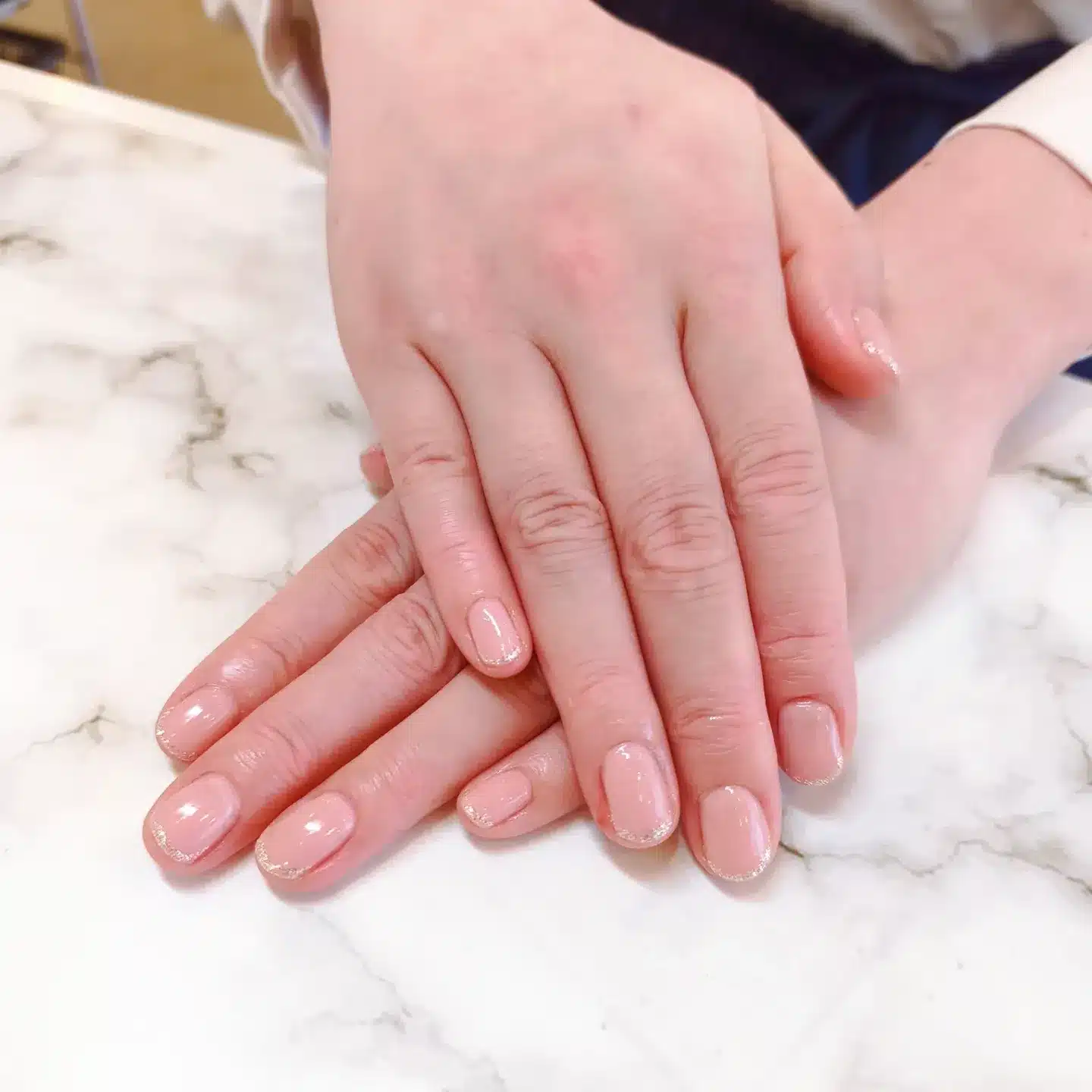 11. Sheer Pink Glitter French Nails - office nail ideas