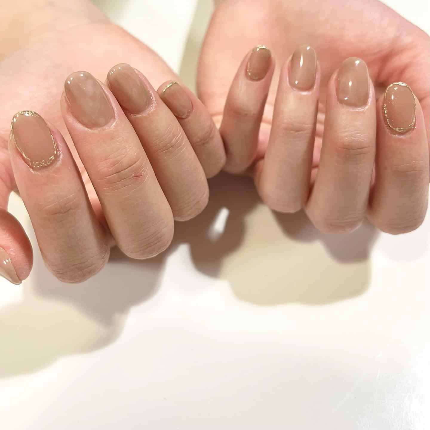 20. Taupe Gloss Nails with Gold Outline - office nail ideas