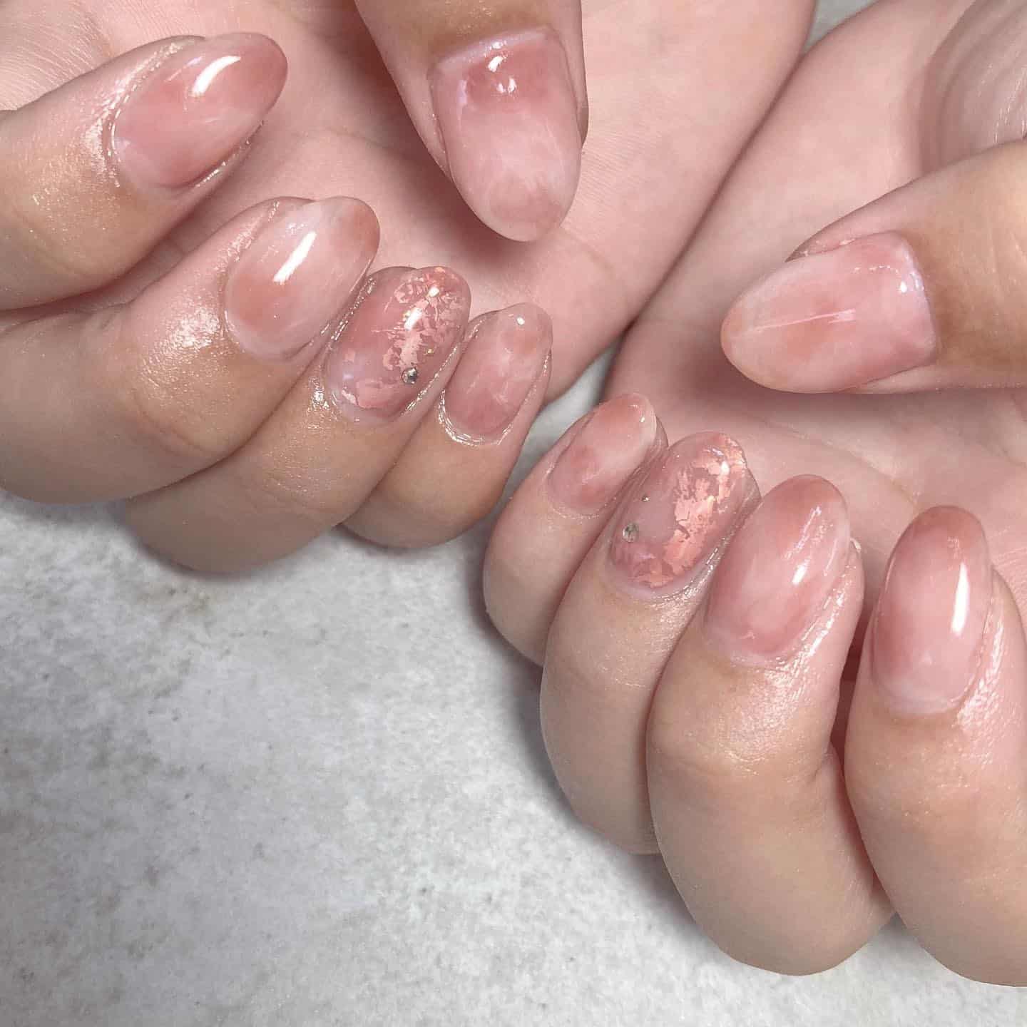 22. Rosy Quartz Marble Accent Nails - office nail ideas