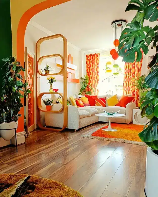 1. Retro Citrus Orange Living Room with Playful Mid-Century Accents - orange living room ideas