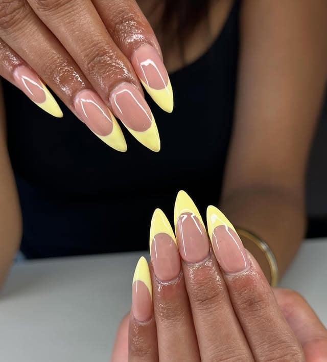 2. Pastel Yellow Stiletto French Tip Nails - yellow french tip nail ideas