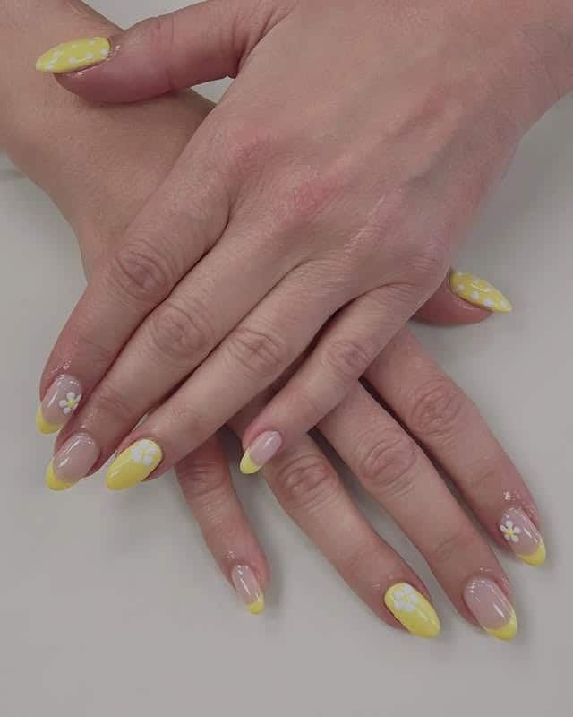 9. Yellow Daisy French Tip Almond Nails - yellow french tip nail ideas