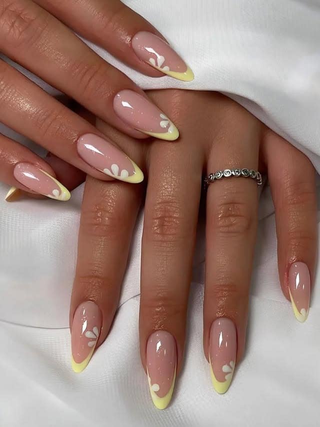 10. Daisy Petal Yellow French Tip Nails - yellow french tip nail ideas