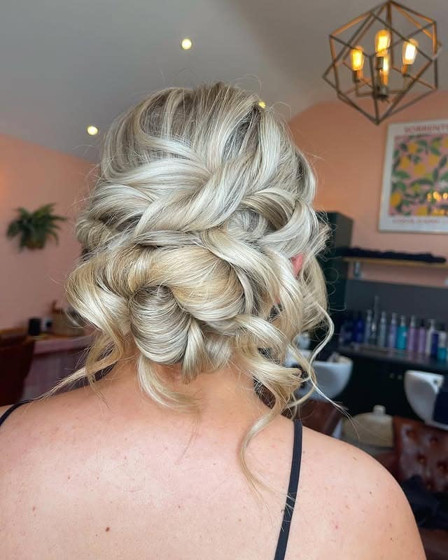 17. Twisted Platinum Blonde Updo - Tousled Hairstyles