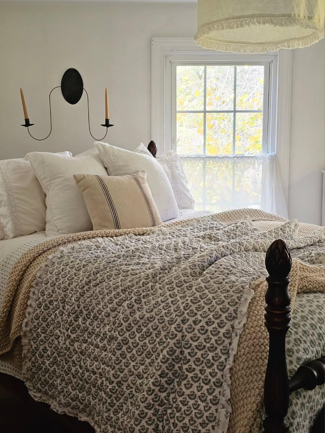 10. Cozy Neutral Farmhouse Bedroom with Soft Patterns - farmhouse bedroom ideas