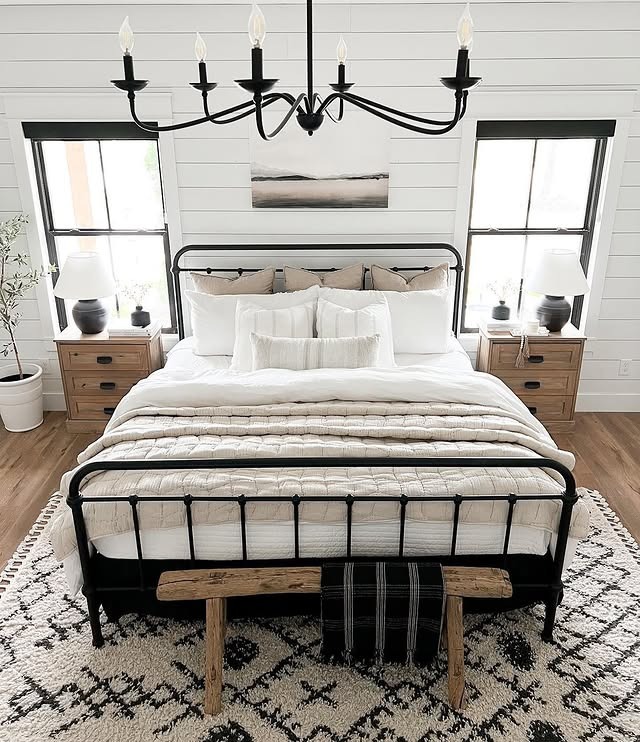 17. Black and White Farmhouse Bedroom with Iron Bed Frame - farmhouse bedroom ideas