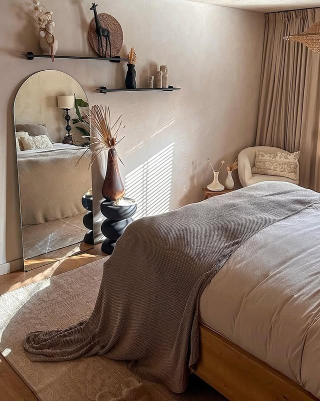 4. Earthy Beige Bedroom with Cozy Layering - beige bedroom ideas