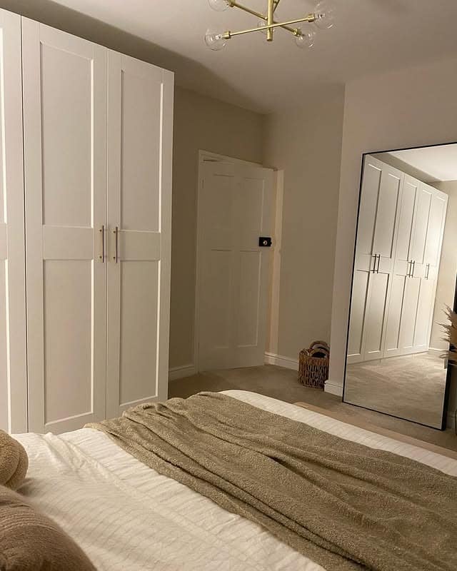 9. Warm Neutral Bedroom with Minimal Decor - beige bedroom ideas