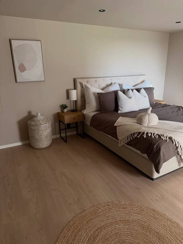 18. Mocha and Beige Bedroom with Layered Textures - beige bedroom ideas