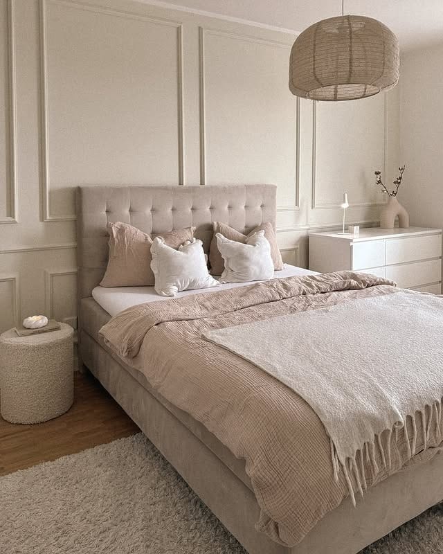 22. Greige Bedroom with Classic Wall Molding - beige bedroom ideas