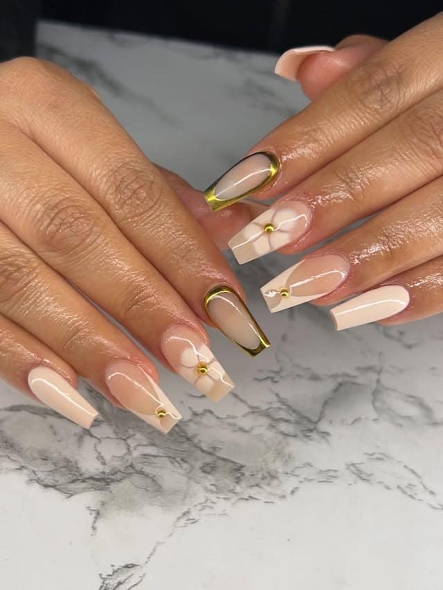 19. Nude Floral Coffin Nails with Gold Chrome - coffin nail ideas